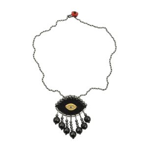 Handmade black velvet evil-eye necklace embroidered with hematite stones, onyx teardrops and a handcrafted brass eye, finished with a hematite rosary chain.