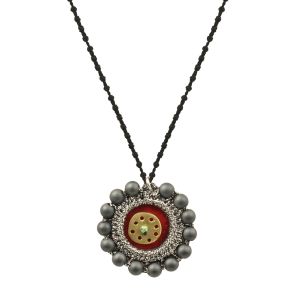 Small round velvet evil eye necklace with silver-thread embroidery, hematite beads and a handmade brass circle on an adjustable knotted cord.